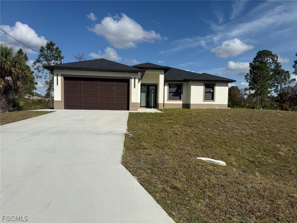 1012 Plumosa Ave., Lehigh Acres, FL 33972