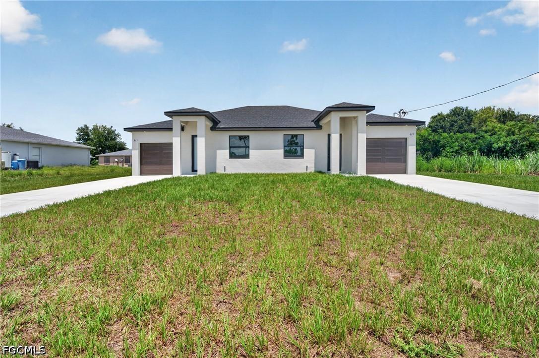 225/227 Ivan Ave., Lehigh Acres, FL 33973