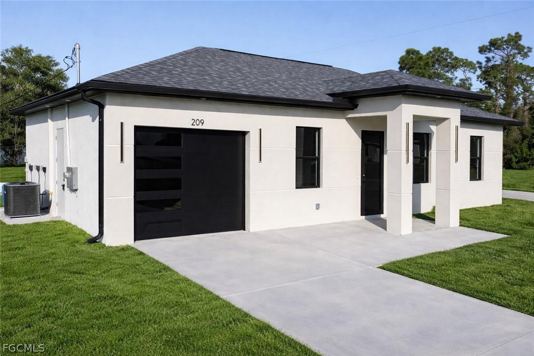 209 Irving Ave., Lehigh Acres, FL 33971