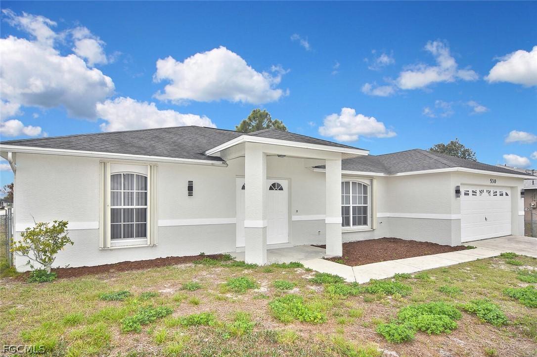530 Peerless Cir., Lehigh Acres, FL 33974