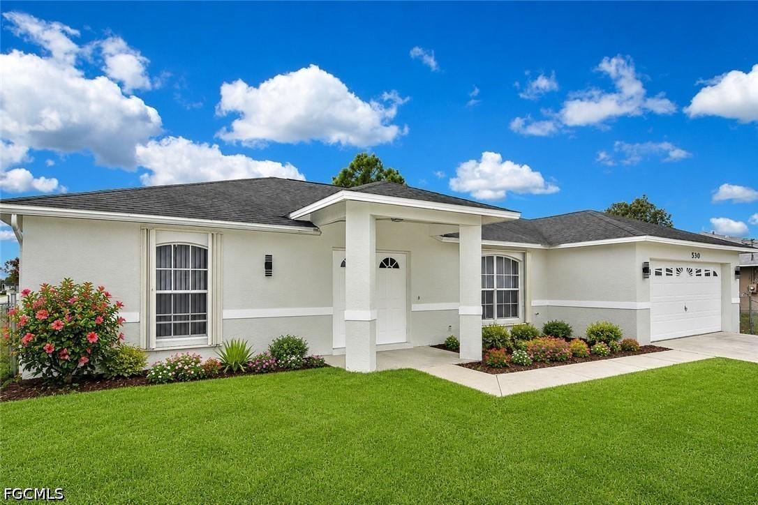 530 Peerless Cir., Lehigh Acres, FL 33974
