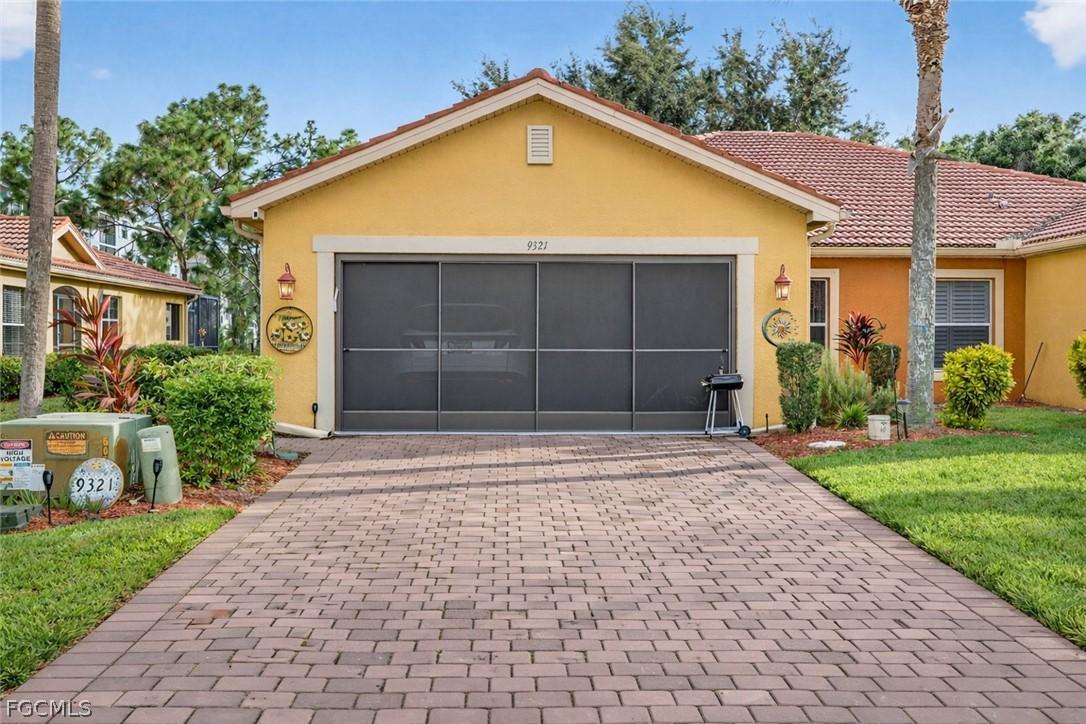 9321 Aegean Cir., Lehigh Acres, FL 33936