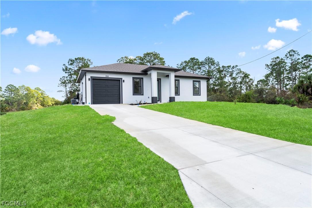 326 Louis Ave., Lehigh Acres, FL 33936