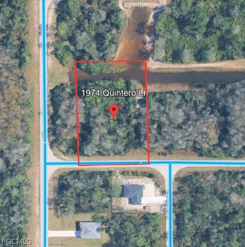 1974 Quintero Ln., Lehigh Acres, FL 33972