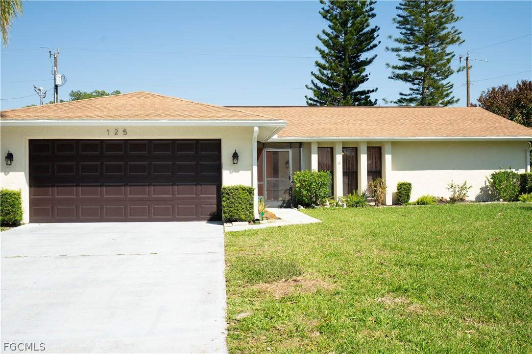 125 Sebring Cir., Lehigh Acres, FL 33936