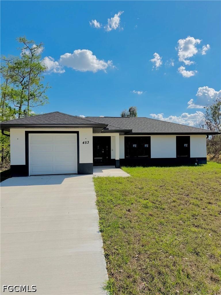 453 Greenbriar Blvd., Lehigh Acres, FL 33972