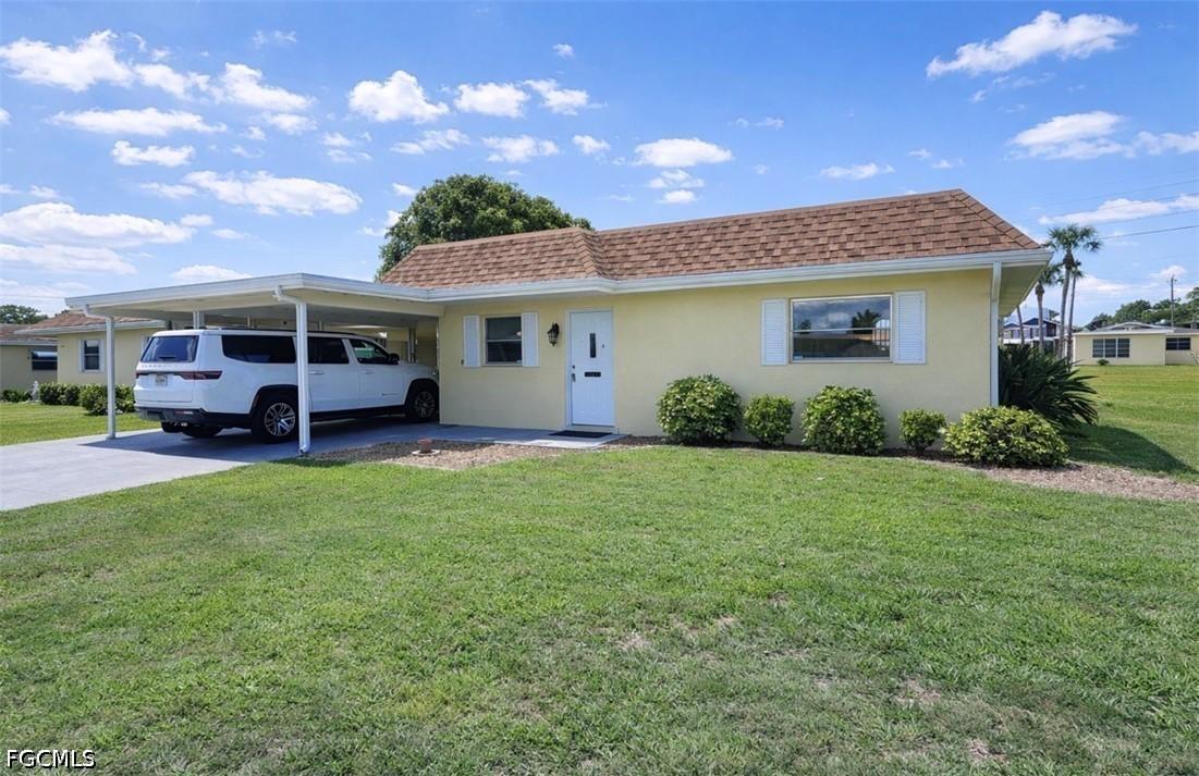2210 Gardenia Way, Lehigh Acres, FL 33936