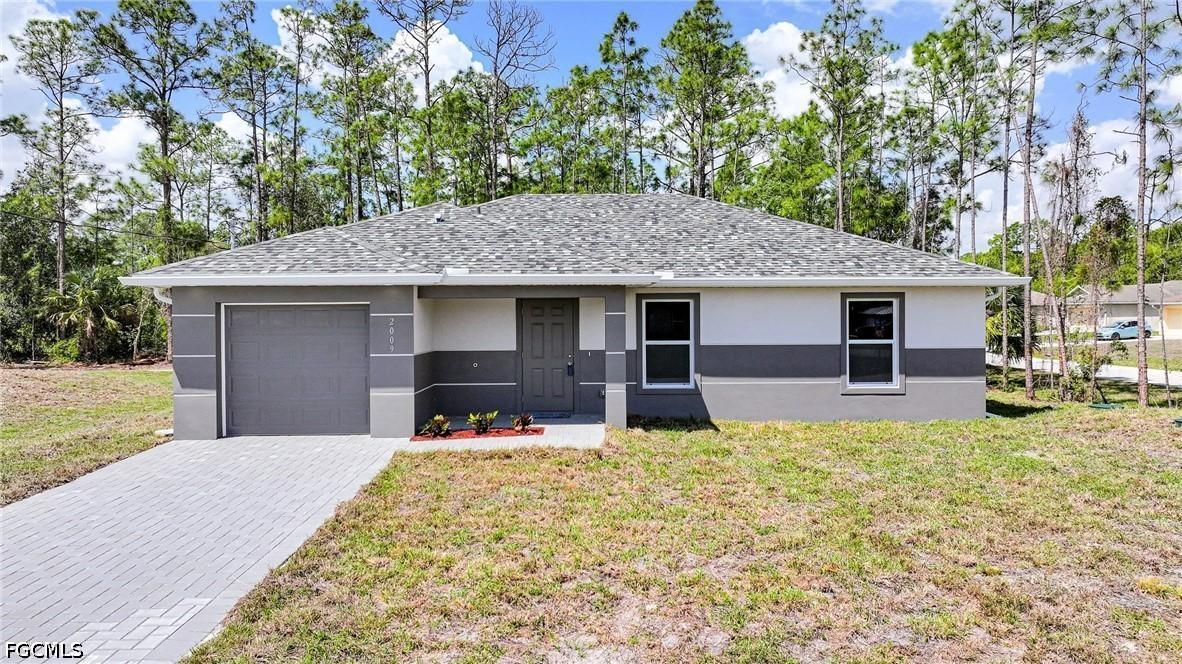 2009 Voss Ct., Lehigh Acres, FL 33972