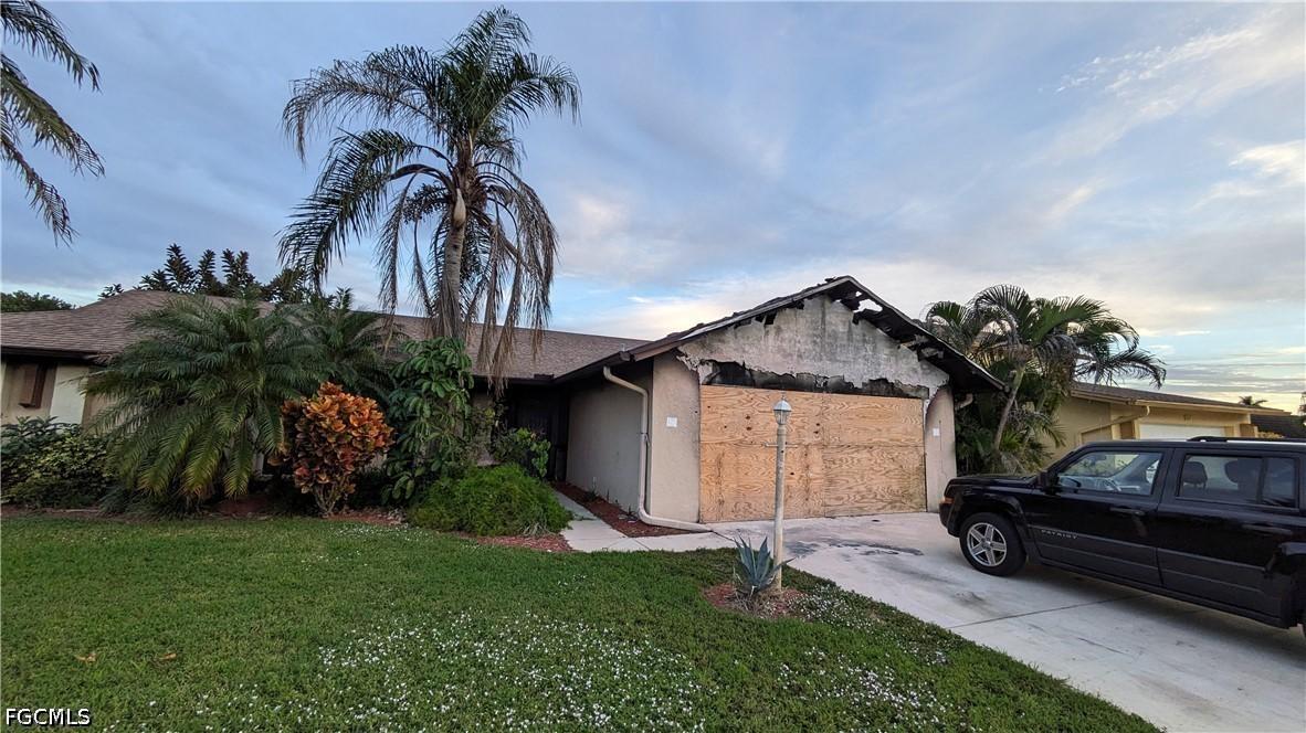 104 Fleur De Lis Ln., Naples, FL 34112