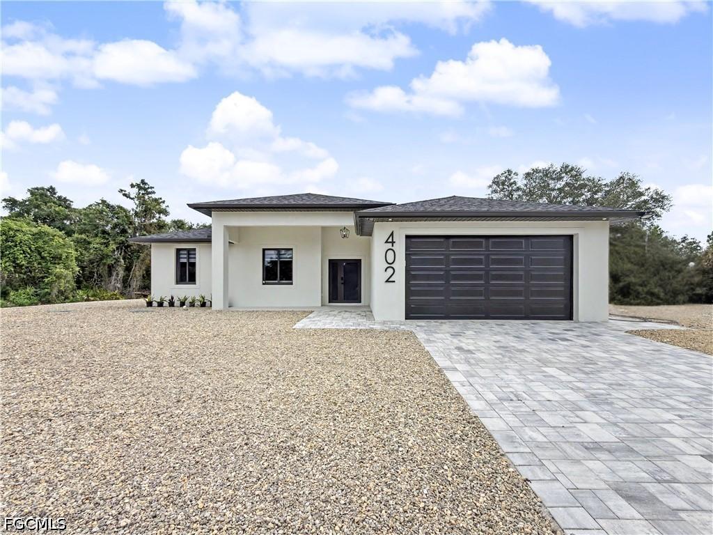402 Thompson Ave., Lehigh Acres, FL 33972
