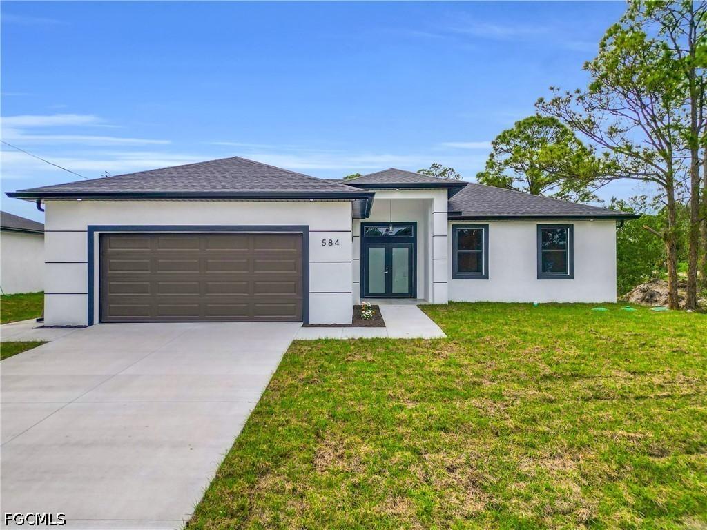 584 Genoa Ave., Lehigh Acres, FL 33974