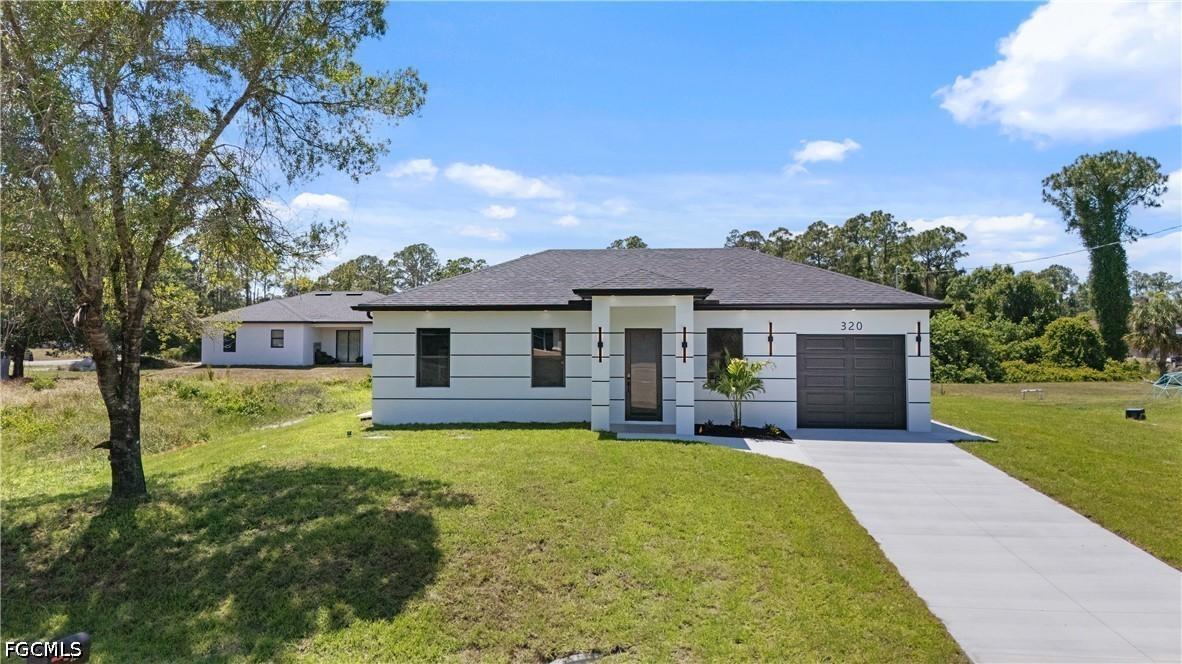 320 Long Ave., Lehigh Acres, FL 33974