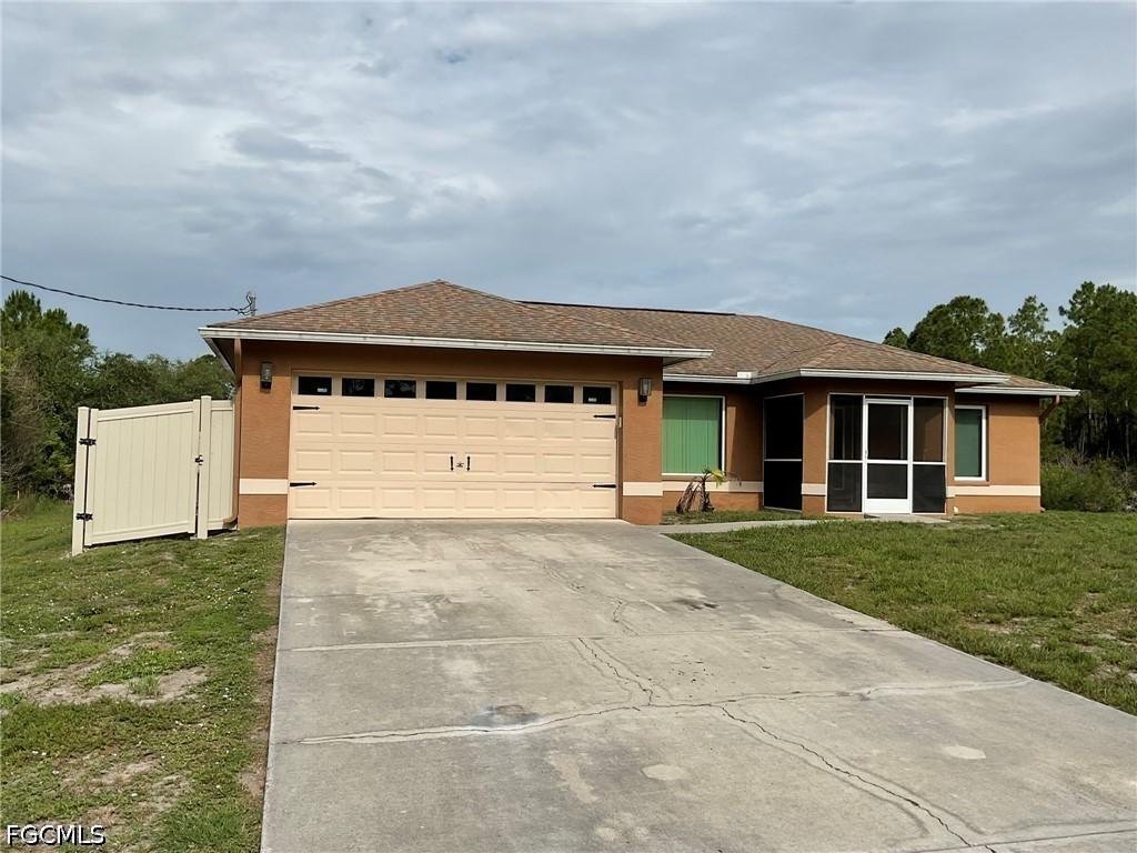 1703 Hibiscus Ave., Lehigh Acres, FL 33972