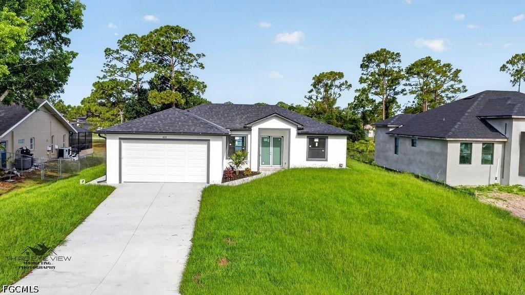 831 Angelo Ave., Lehigh Acres, FL 33971