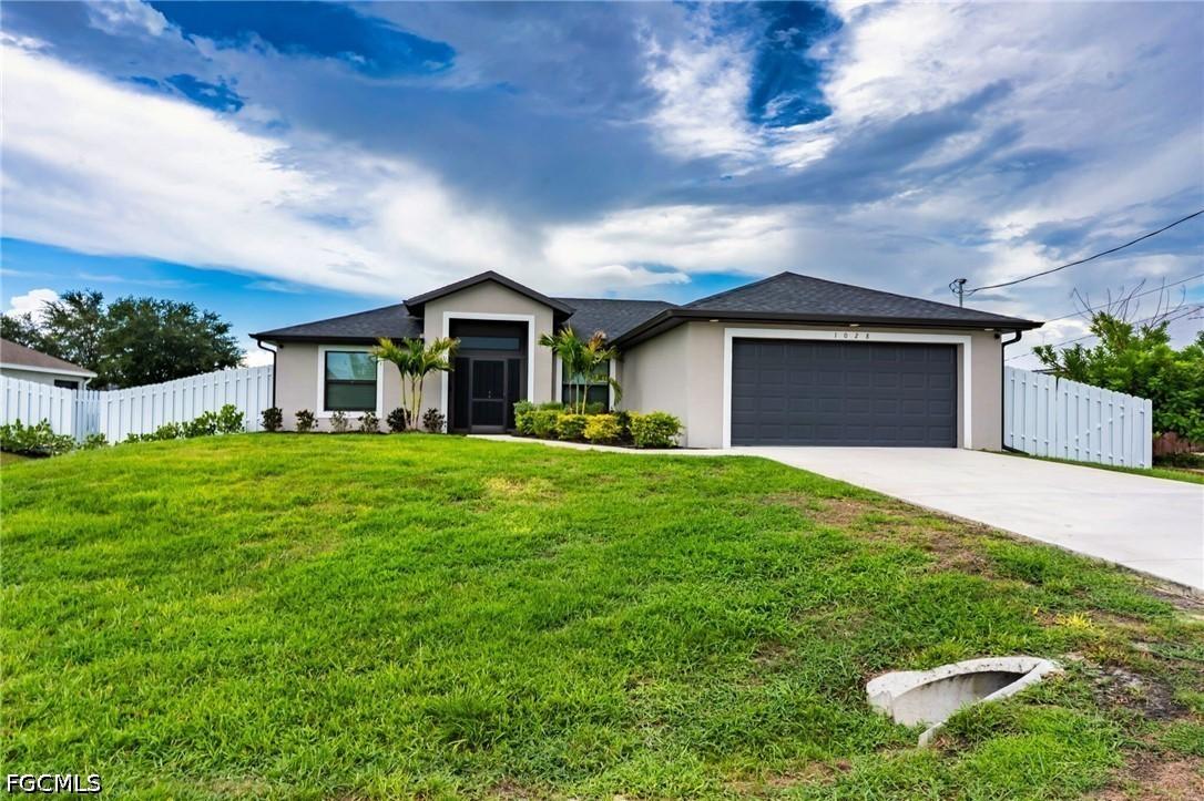 1028 Champion Ave., Lehigh Acres, FL 33971