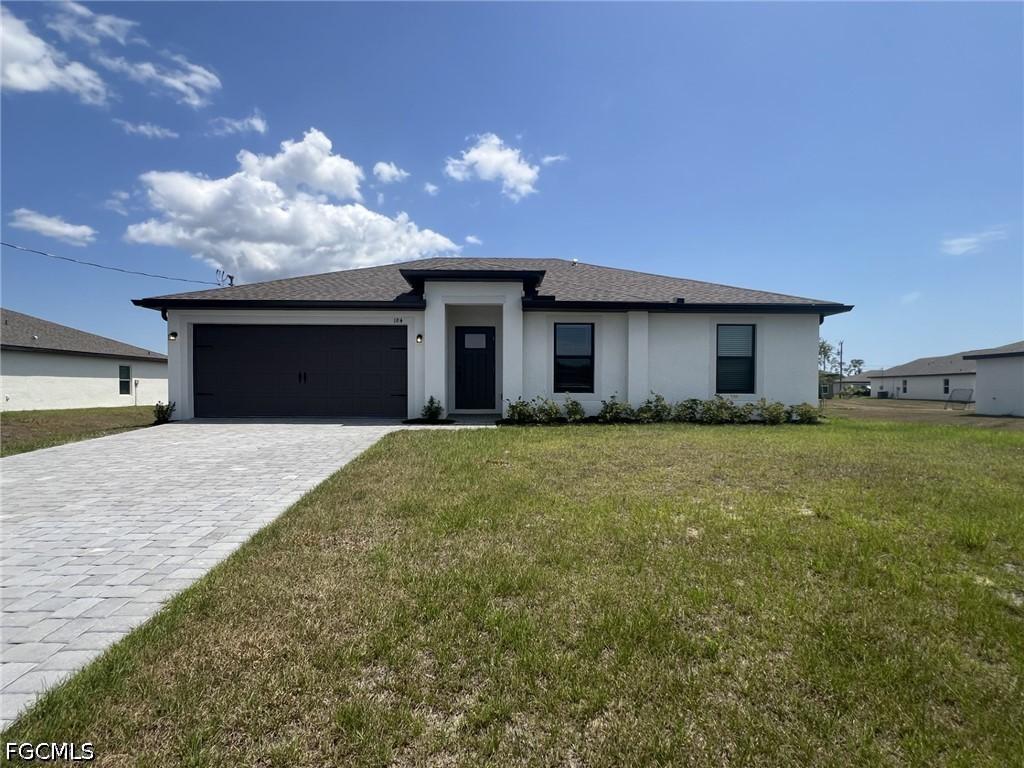 448 Burrstone Dr., Lehigh Acres, FL 33974