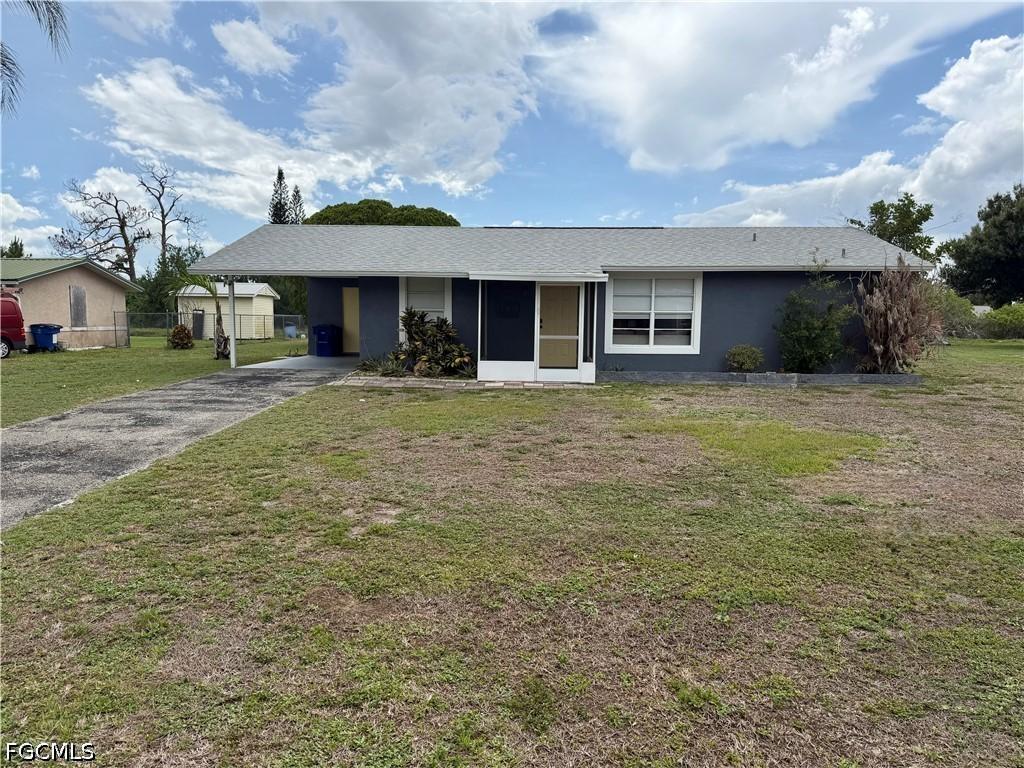 311 Schoolside Dr., Lehigh Acres, FL 33936
