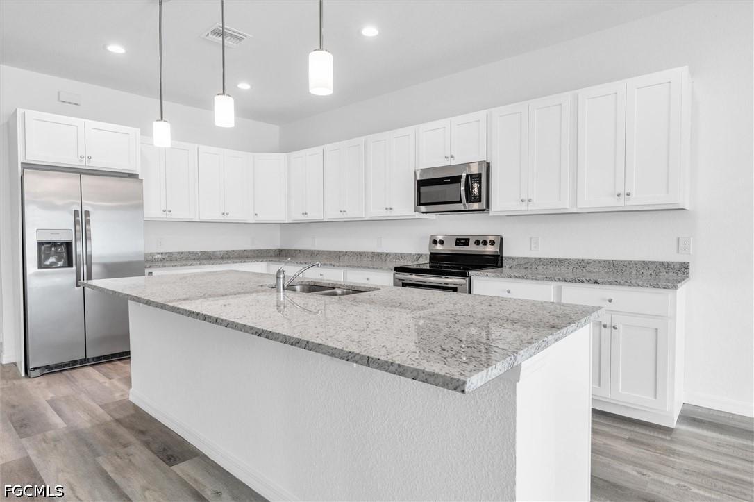 422 NE 20th Ter., Cape Coral, FL 33909