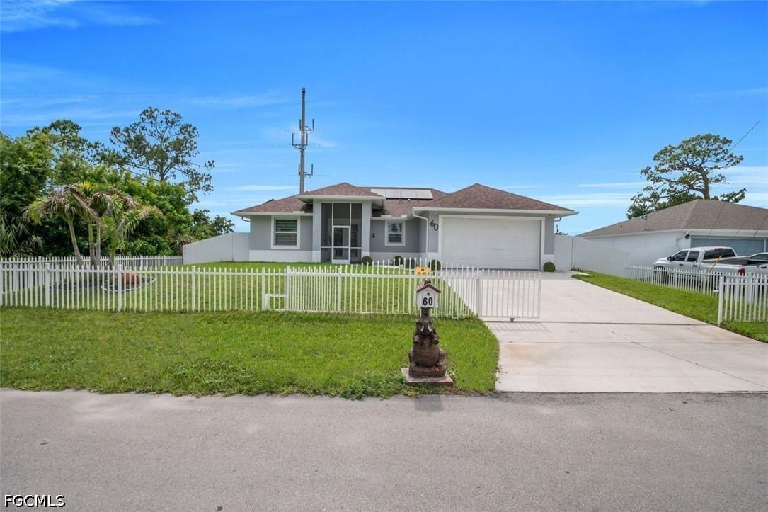 60 Floyd Ave., Lehigh Acres, FL 33976