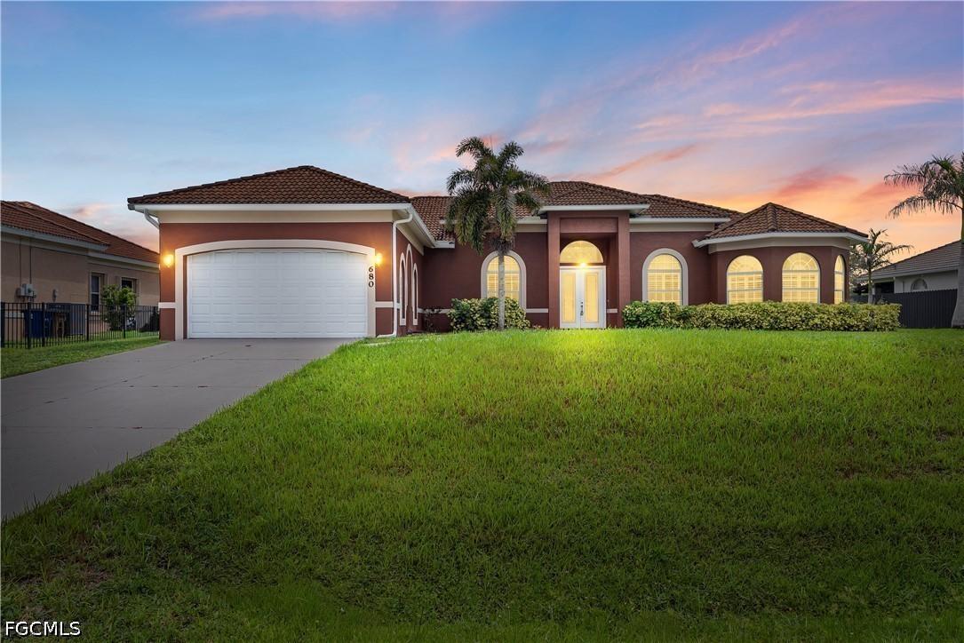 680 Mirror Lakes Ct., Lehigh Acres, FL 33974
