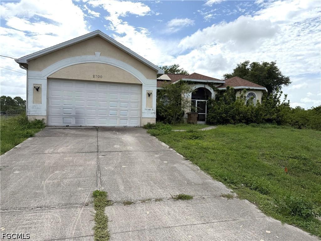 2700 Rita Ave., Lehigh Acres, FL 33971