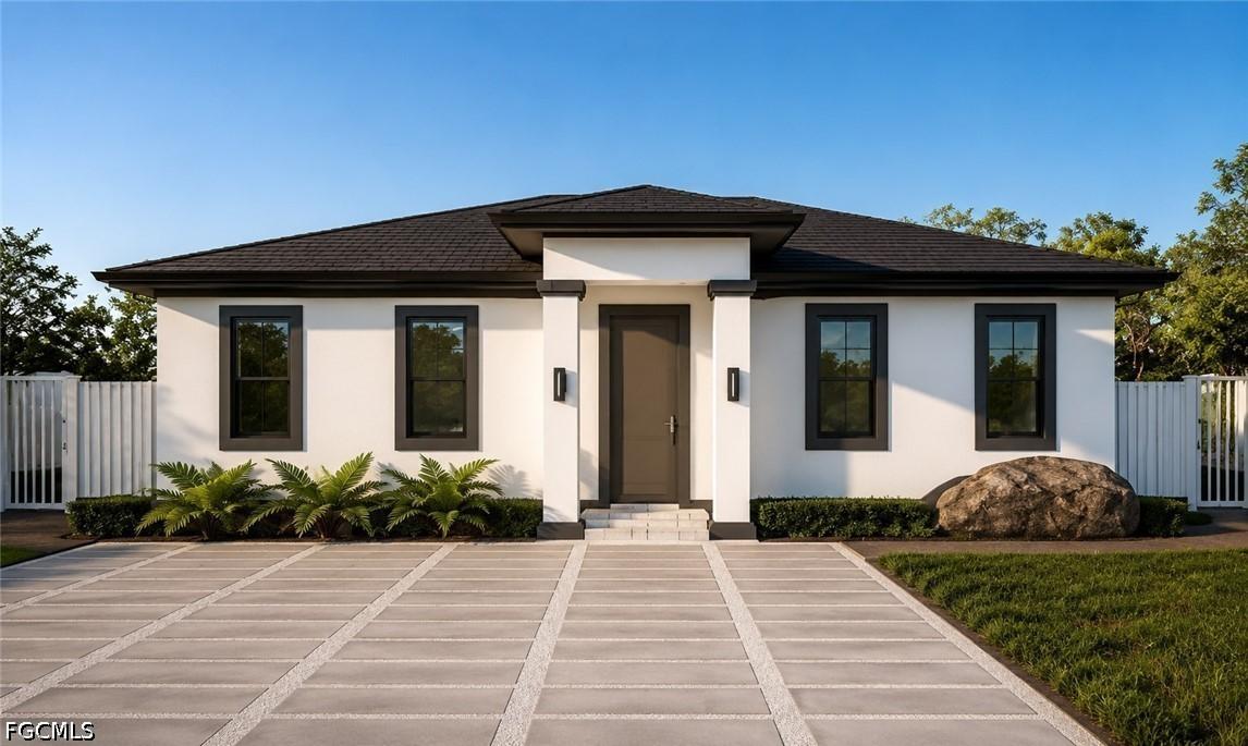 932 Dempsey St., Lehigh Acres, FL 33974