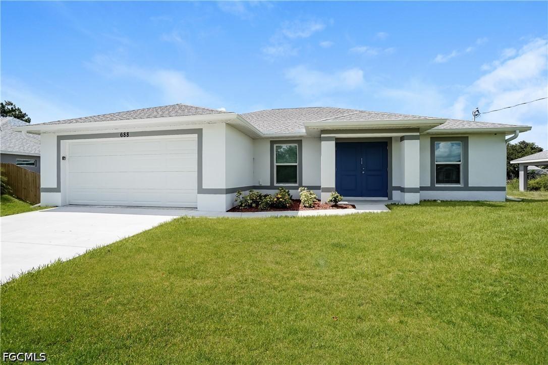 688 Manhattan St., Lehigh Acres, FL 33974
