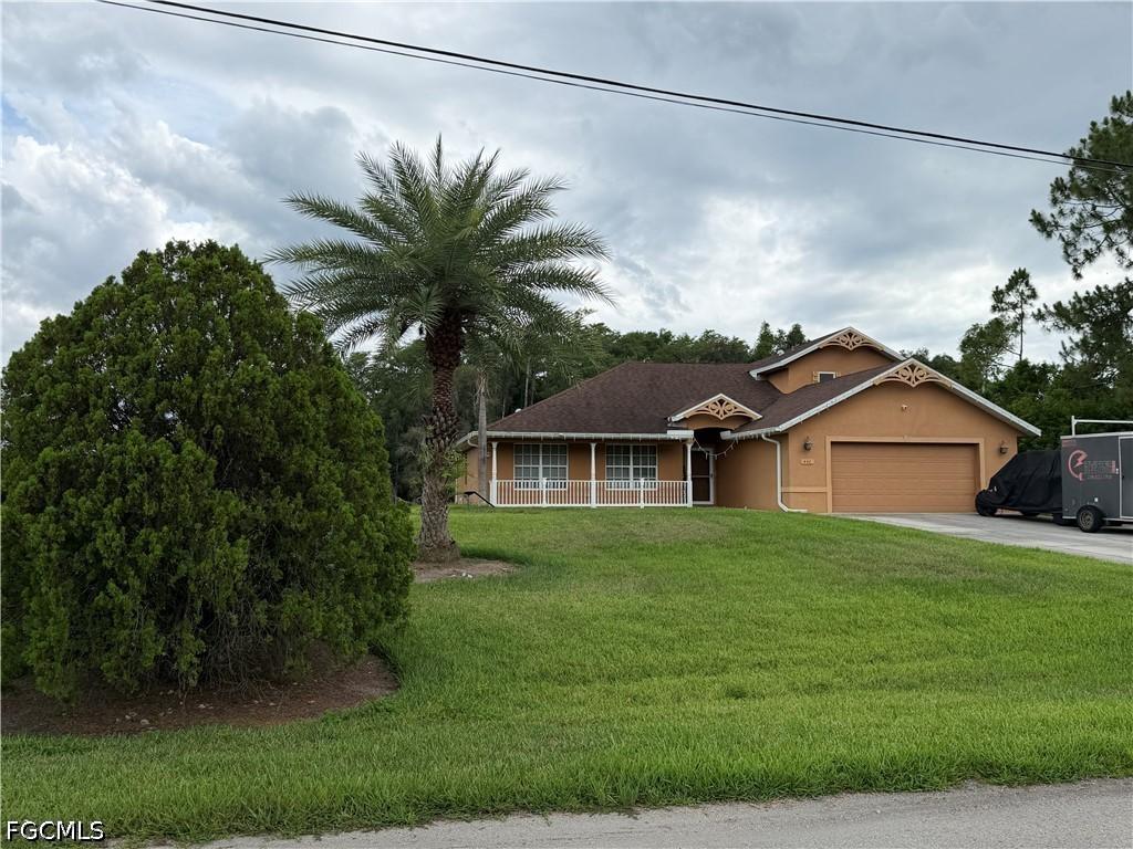 446 Jaipur Dr., Lehigh Acres, FL 33974
