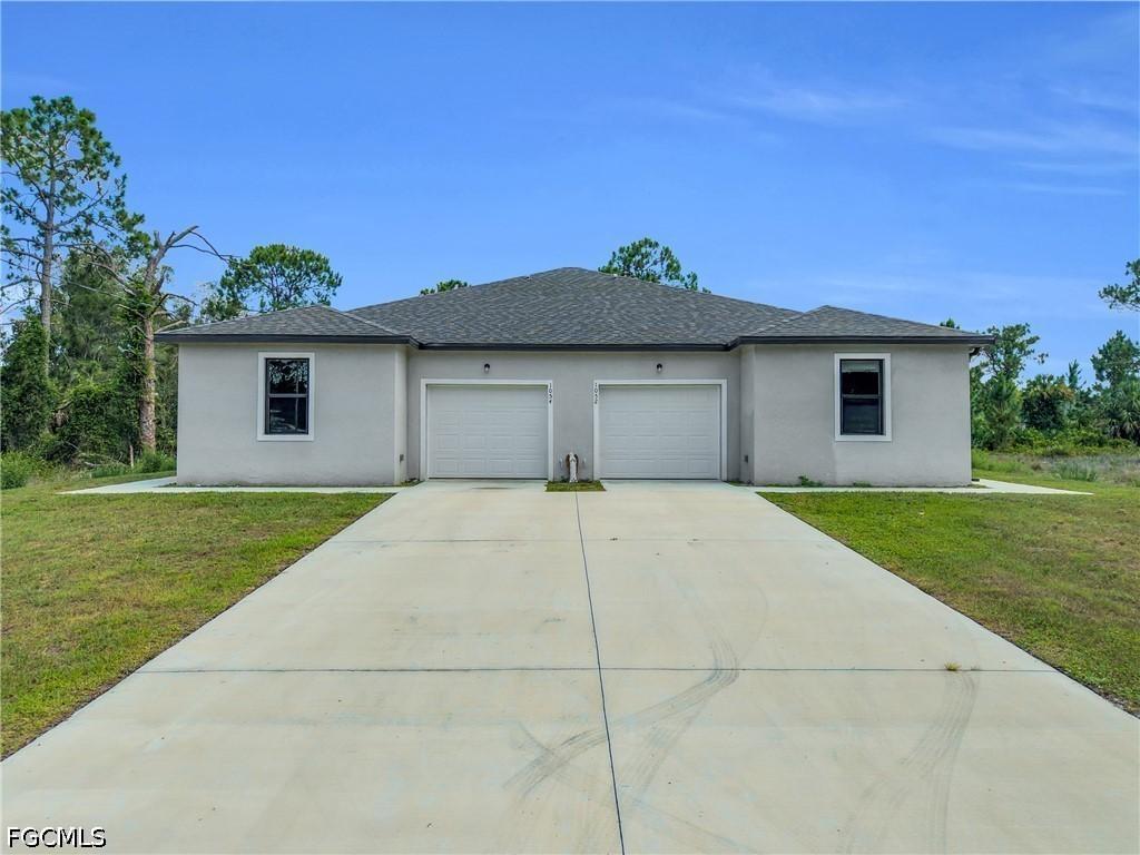 1054 Ainsworth St., Lehigh Acres, FL 33974