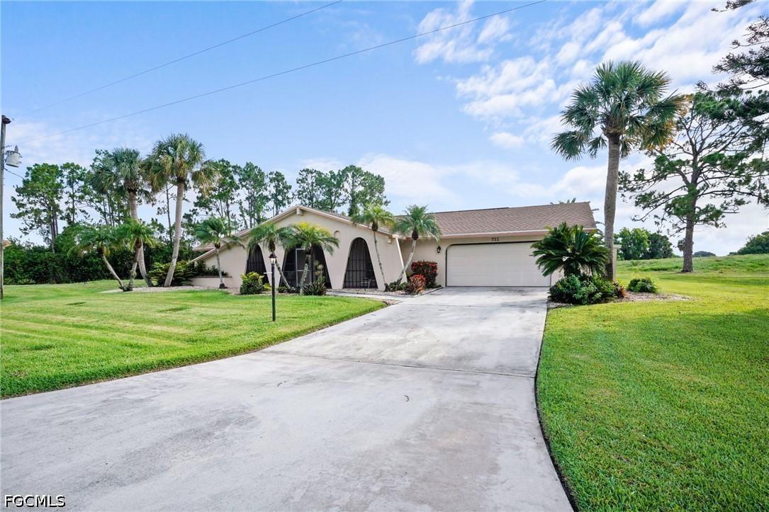 711 Mirror Lakes Dr., Lehigh Acres, FL 33974