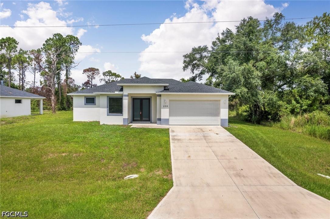 208 Genoa Ave., Lehigh Acres, FL 33974