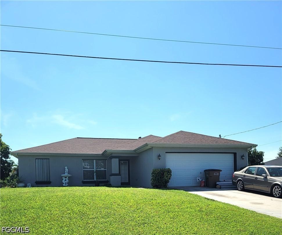 313 SW 14th Pl., Cape Coral, FL 33991
