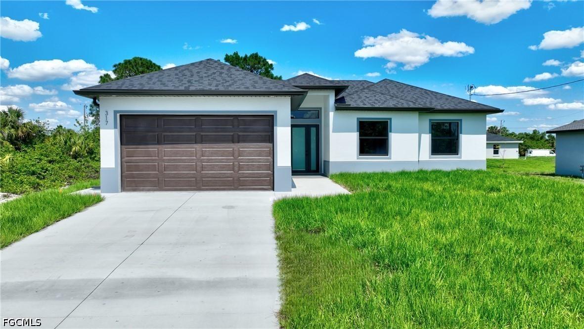 317 Lancelot Ave., Lehigh Acres, FL 33974