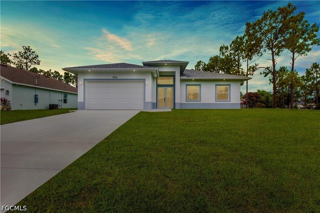 654 Trinity St., Lehigh Acres, FL 33974