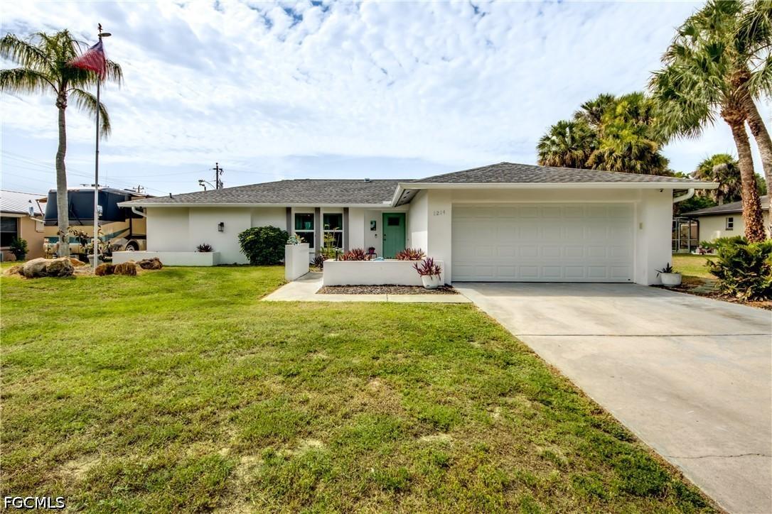 1214 Baldwin Pl., Lehigh Acres, FL 33936