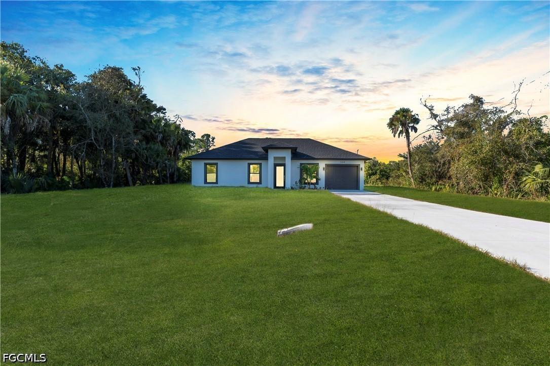 644 Woodcrest Dr., Lehigh Acres, FL 33972