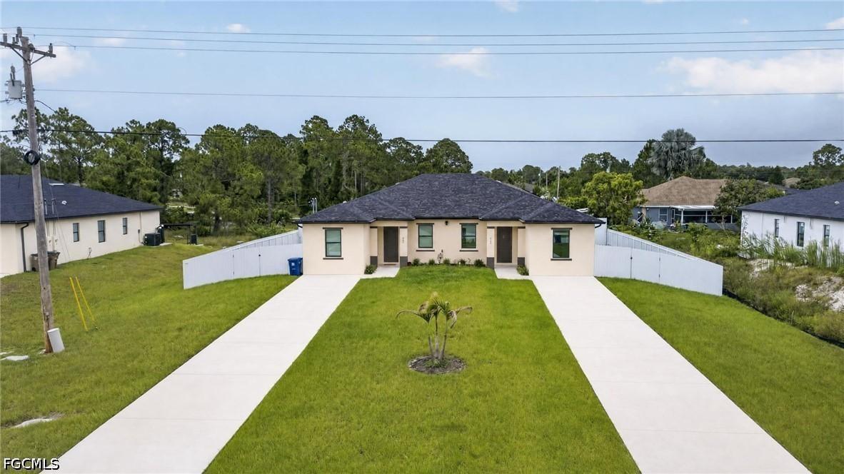 909/911 Homestead Rd., Lehigh Acres, FL 33974