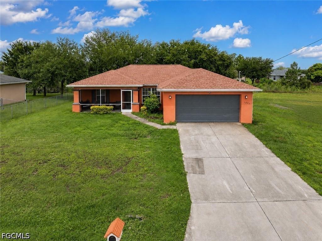 1602 Dora Ave., Lehigh Acres, FL 33976
