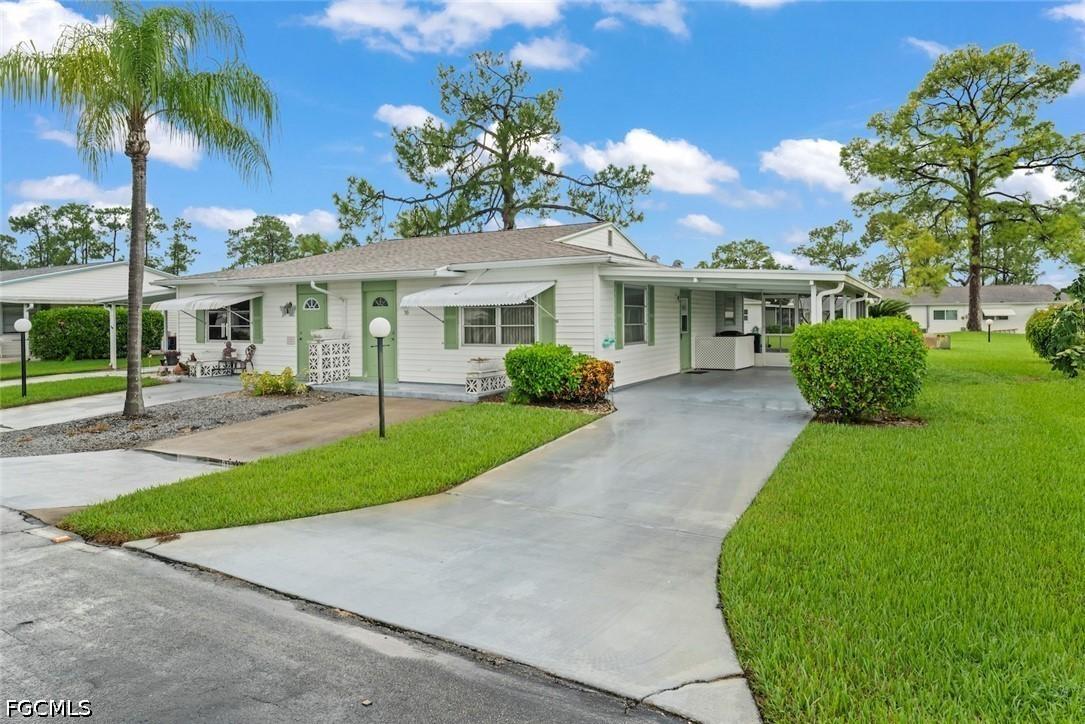 16 Dawn Flower Cir., Lehigh Acres, FL 33936