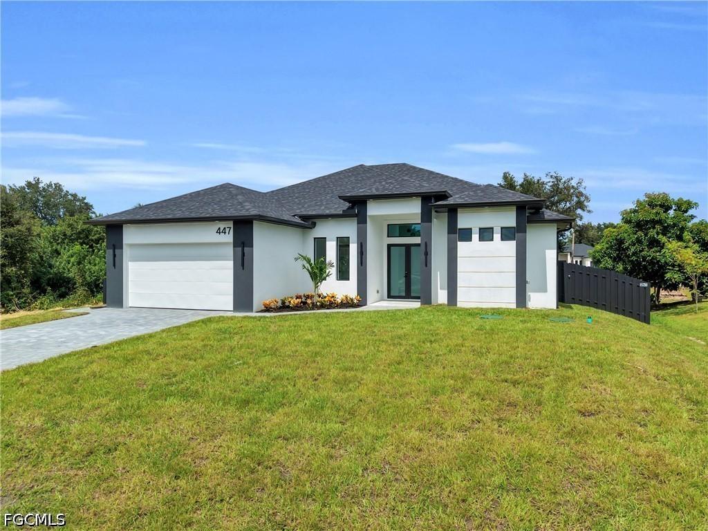447 Rathburn St., Lehigh Acres, FL 33974