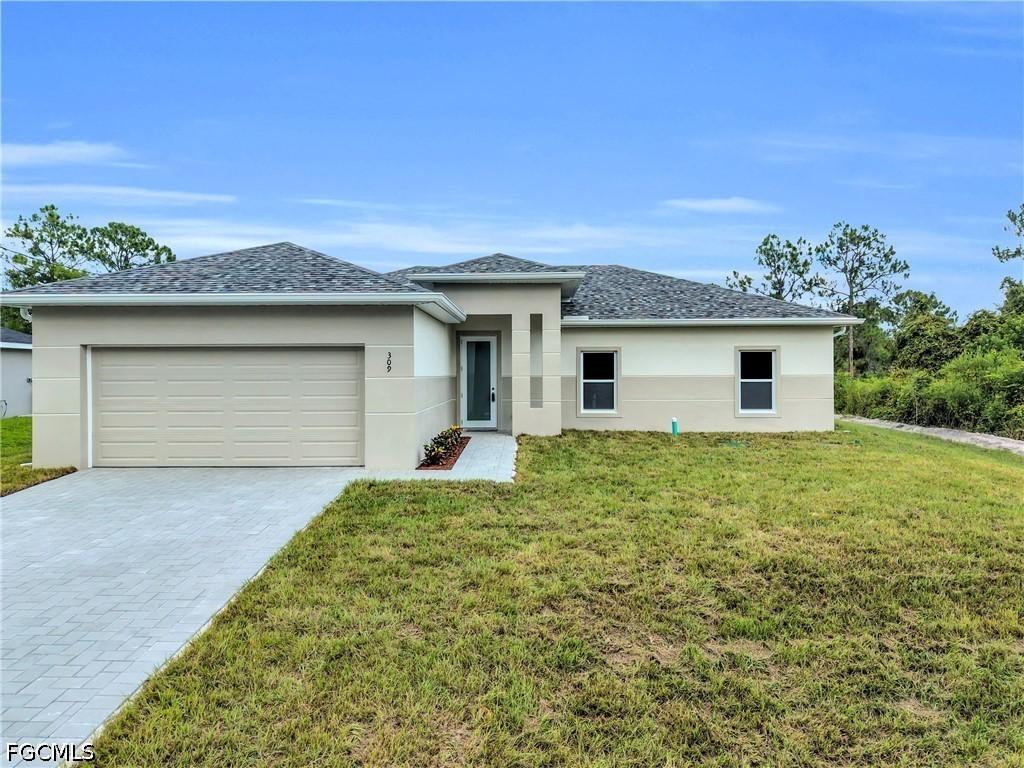 309 Broward Ave., Lehigh Acres, FL 33974