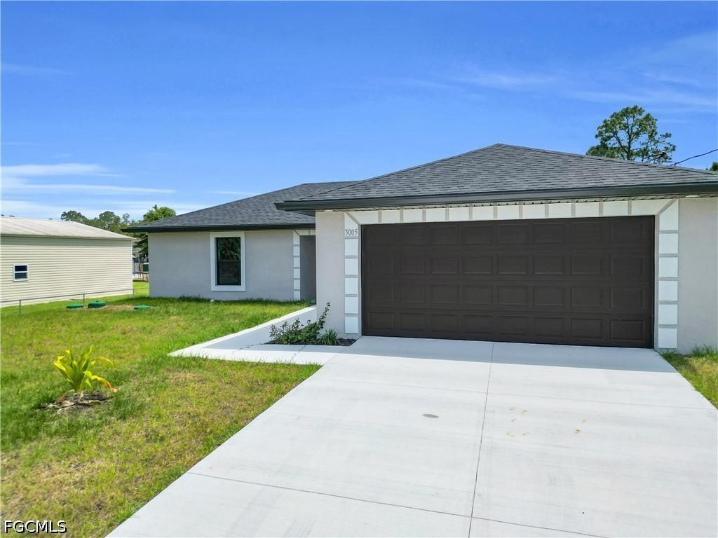 823 Mckinley Ave., Lehigh Acres, FL 33972