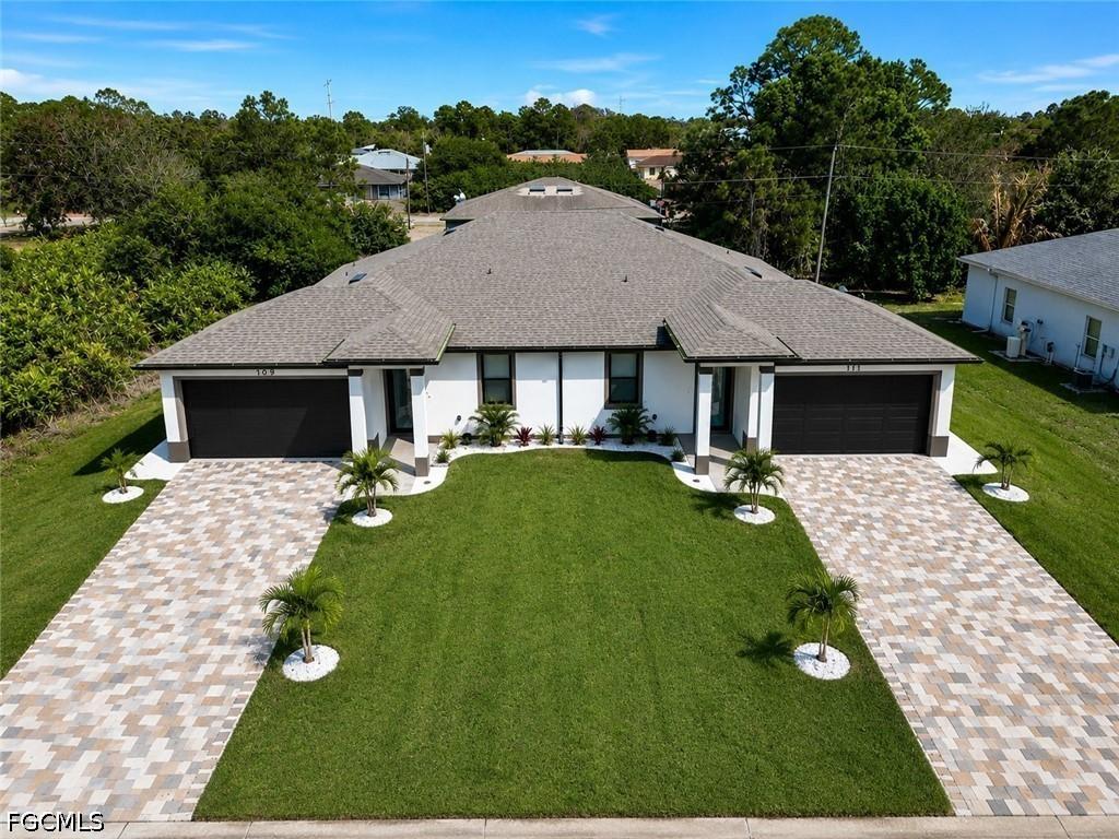 109/111 Harry Ave., Lehigh Acres, FL 33973