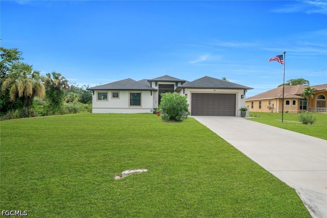 609 Clayton Ave., Lehigh Acres, FL 33972
