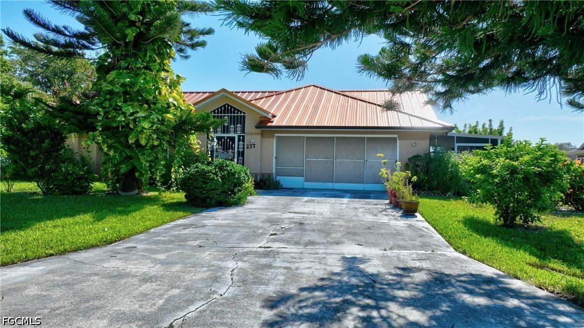 237 Lauberge Ct., Lehigh Acres, FL 33936