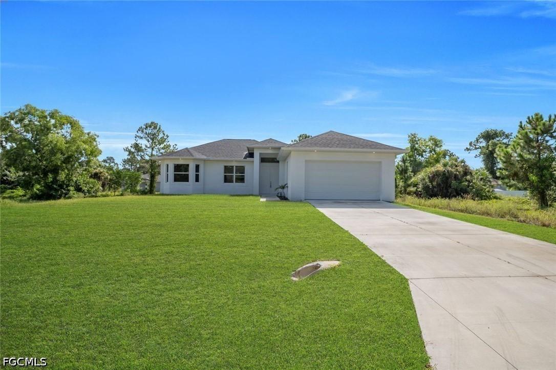 523 Harry Thayer Ave., Lehigh Acres, FL 33974