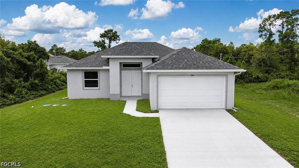 306 Lenz Ave., Lehigh Acres, FL 33974