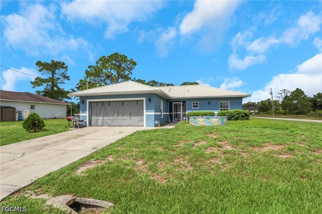 912 Mary Ave., Lehigh Acres, FL 33974