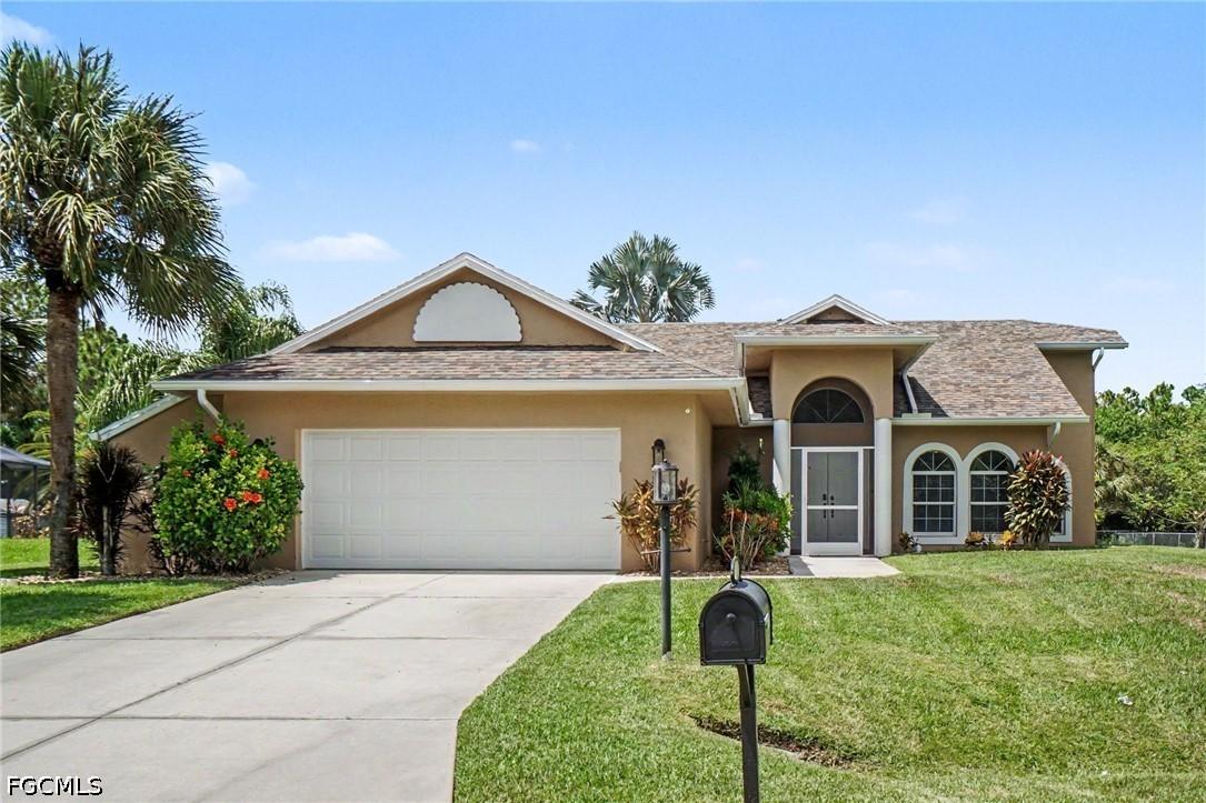 405 Poinsettia Ave., Lehigh Acres, FL 33972
