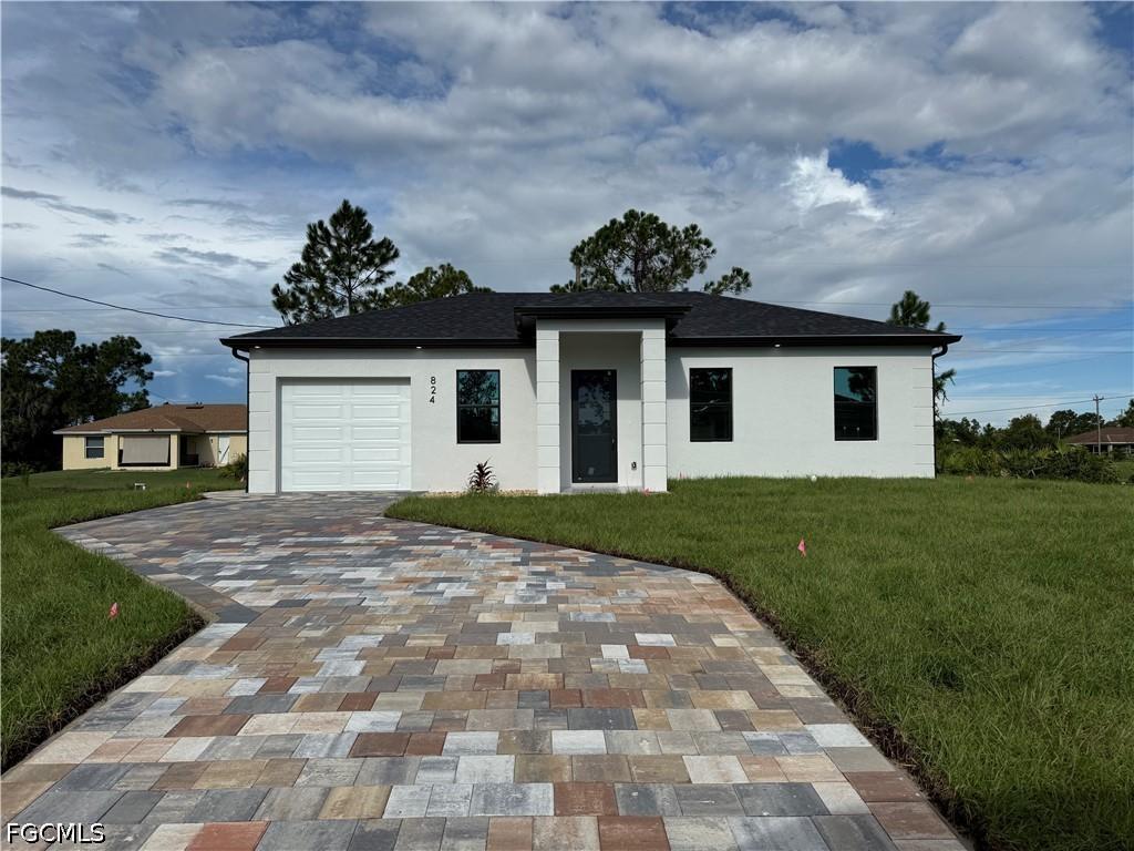 824 Dawhert Ave., Lehigh Acres, FL 33974